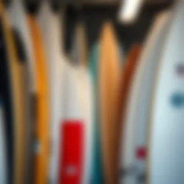 A diverse selection of used surfboards displayed for sale