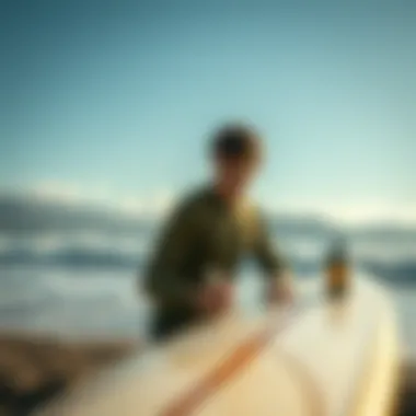 A surfer caring for a surfboard with eco-friendly products