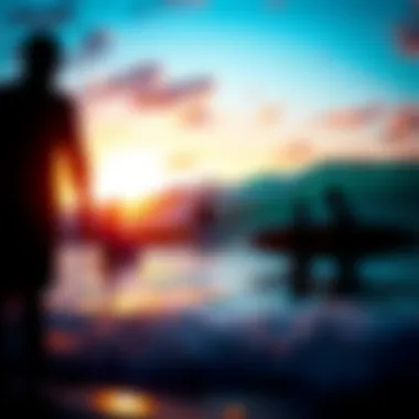 Surfers enjoying the vibrant sunset at Kanaha Beach