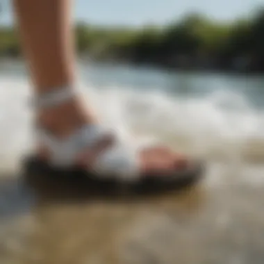 Demonstration of Billabong sandals in action during a watersport activity.