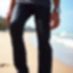 Stylish black beach pants on sandy shore