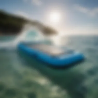 A vibrant inflatable boogie board floating on clear blue waters