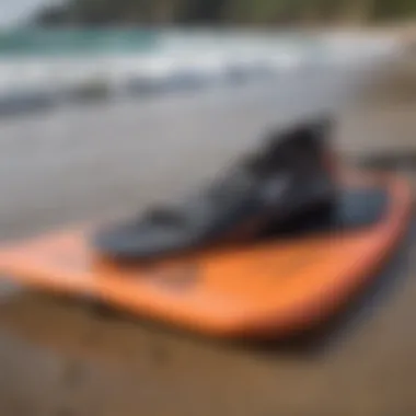 Close-up of a bodyboard's fin and leash attachment.