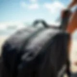 Close-up of DaKine wheeled surfboard bag featuring robust zippers and padding