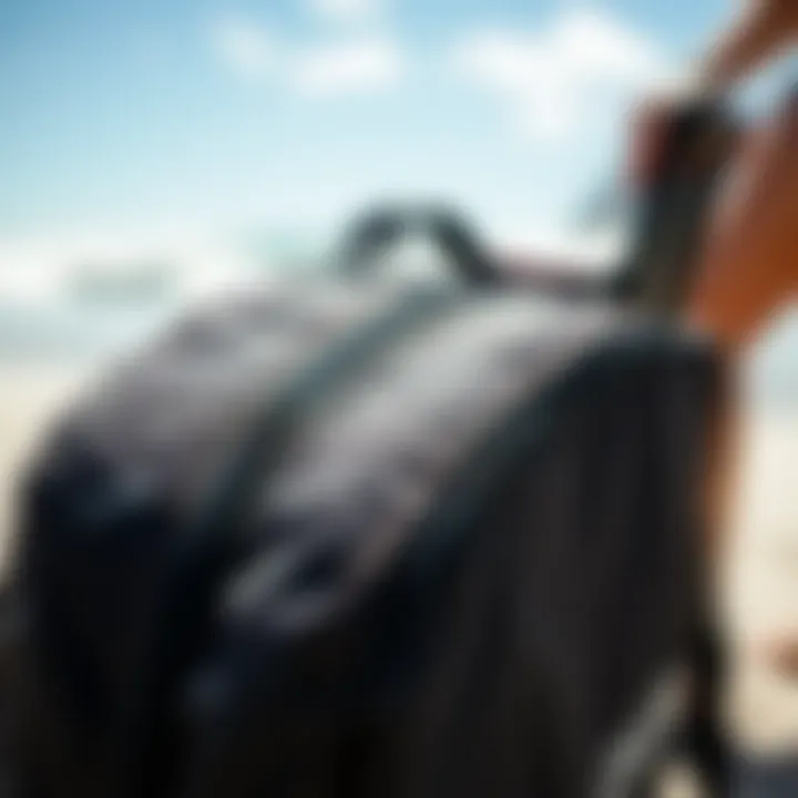 Detailed View of Bag Features Close-up of DaKine wheeled surfboard bag featuring robust zippers and padding