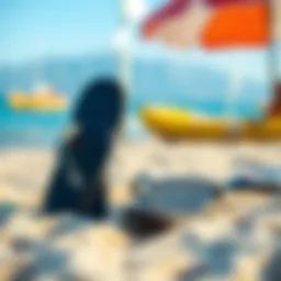 A pair of Del Sol flip flops on a sandy beach