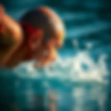 A swimmer coming out of the water with water splashing
