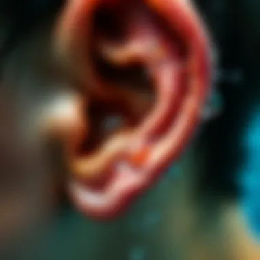 Understanding Water Accumulation in the Ear A close-up of an ear with water droplets