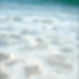 A serene beach scene with clear water and waves