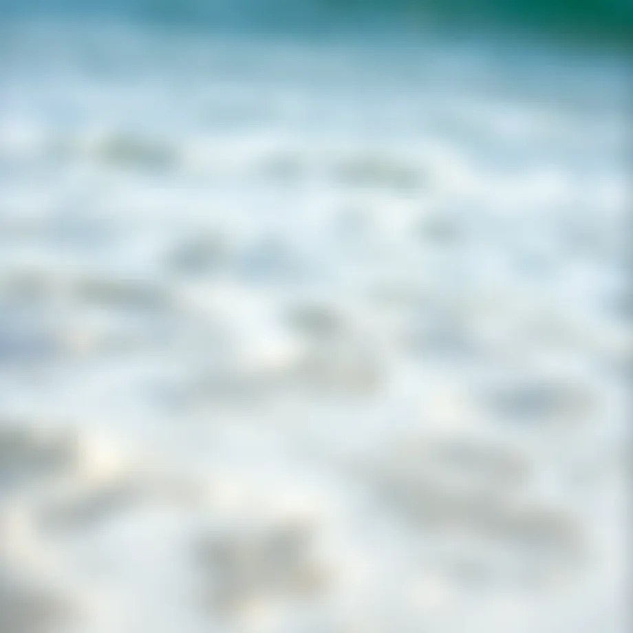 A serene beach scene with clear water and waves