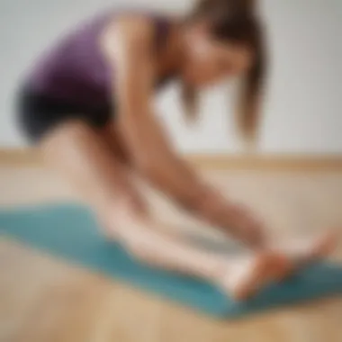 A person performing a calf stretch on a yoga mat