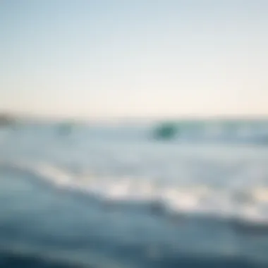 A serene coastline with gentle waves lapping at the shore