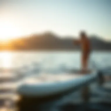 Person measuring paddle board size