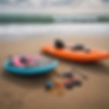 Essential bodyboarding gear laid out on the sand