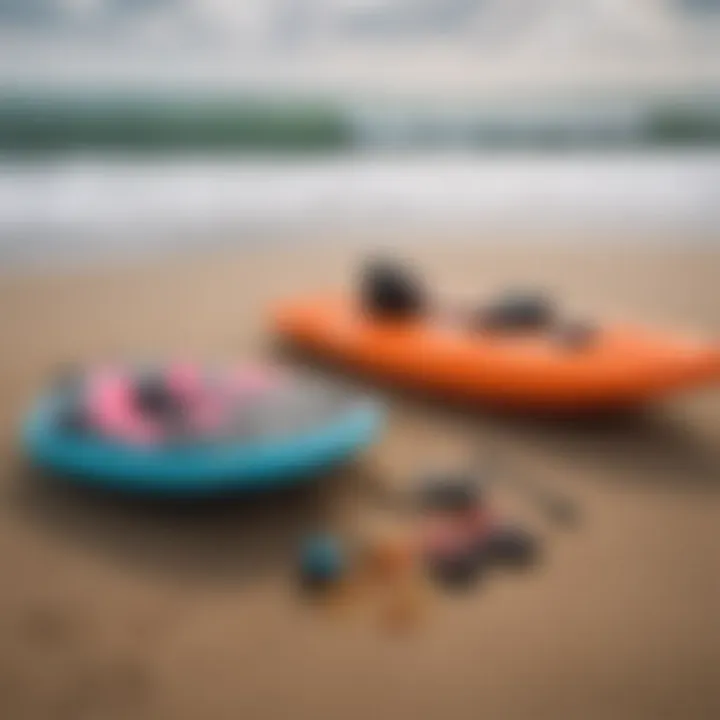 Essential bodyboarding gear laid out on the sand