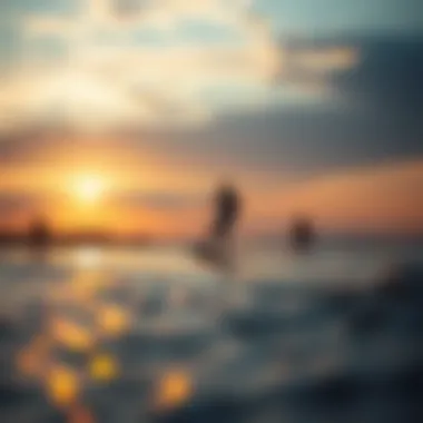 A serene sunset backdrop with wakeboarders on the water