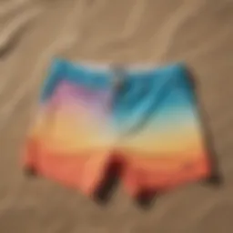 Showcasing the vibrant colors of Billabong recycled shorts on a sandy beach