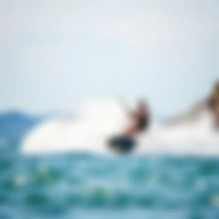 Rider in Action on the Cabrinha Wing Board Rider demonstrating the Cabrinha Wing Board in action on water