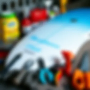 Tools for Maintaining High Performance Fish Surfboards Maintenance tools and products arranged around a fish surfboard for care