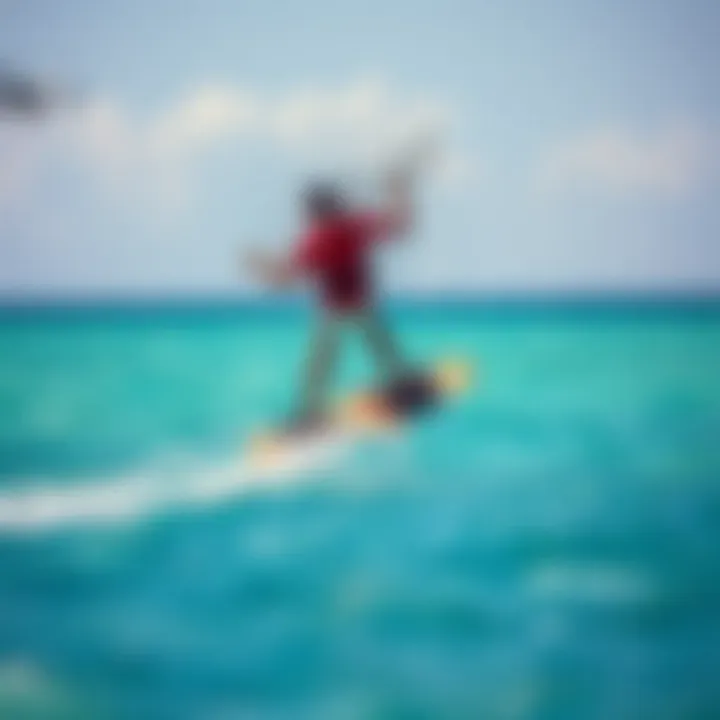 Kiteboarder soaring through the clear blue waters of Bonaire