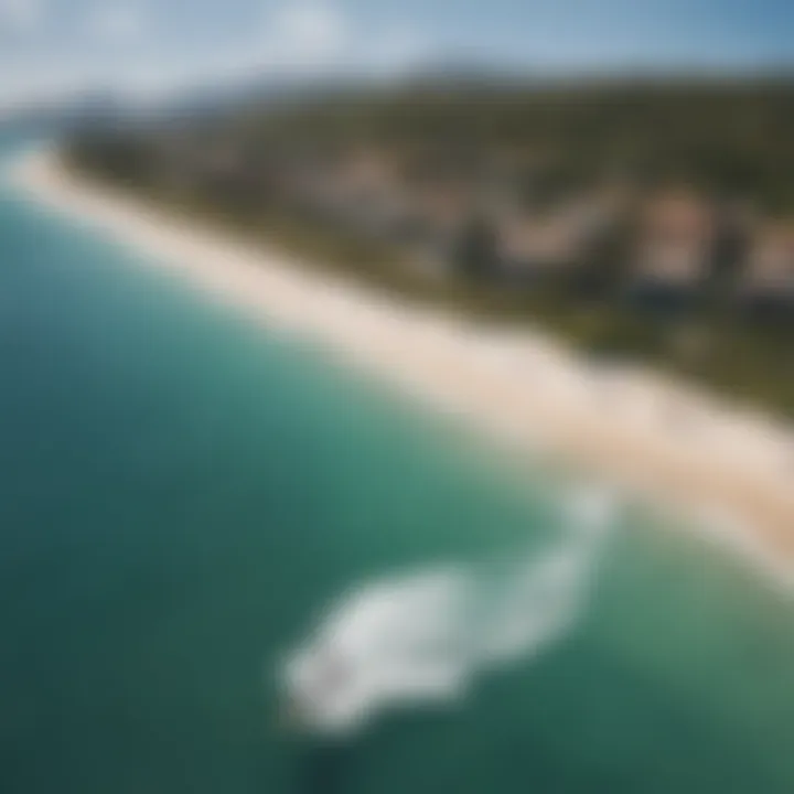 An aerial view of a popular kiteboarding destination, showcasing the stunning coastline and water conditions