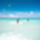 A breathtaking view of kiteboarders catching waves in the turquoise waters of Turks and Caicos