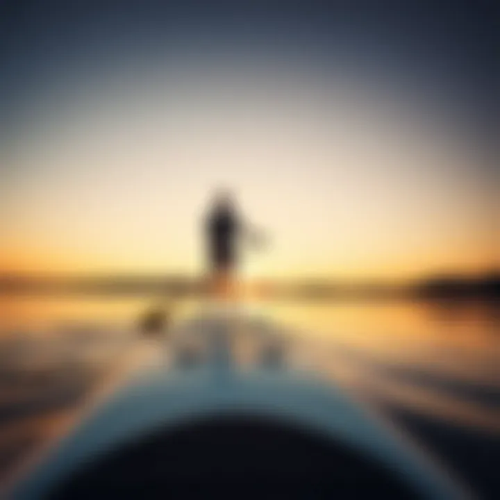 Serene Sunset with the Laird Paddle Board A serene sunset view reflecting on the water while paddling with the Laird board