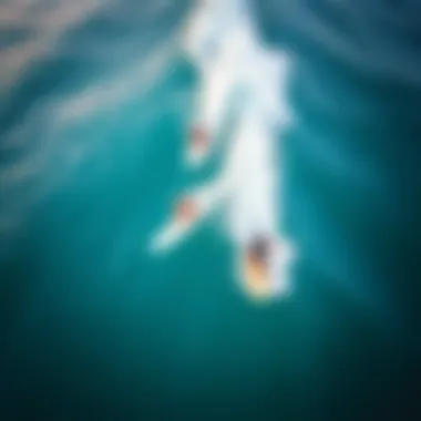 Surfers at Macaronis Aerial shot of surfers riding the waves at Macaronis