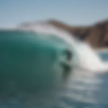 Surfer catching a wave at a popular Baja California surf spot