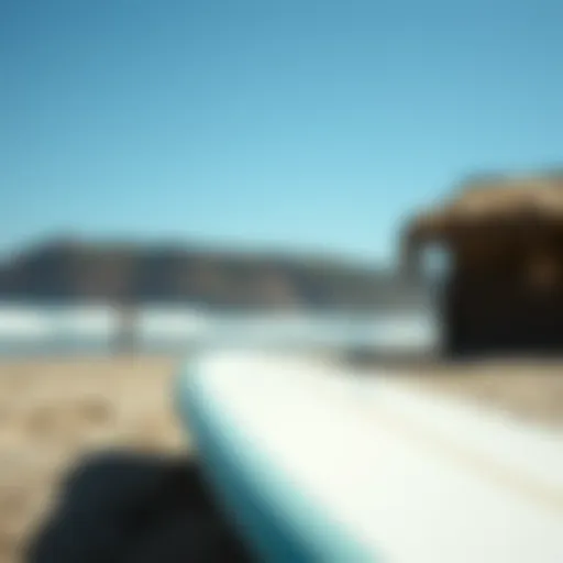 Surfboard at El Porto Surfboard resting on the sandy beach at El Porto