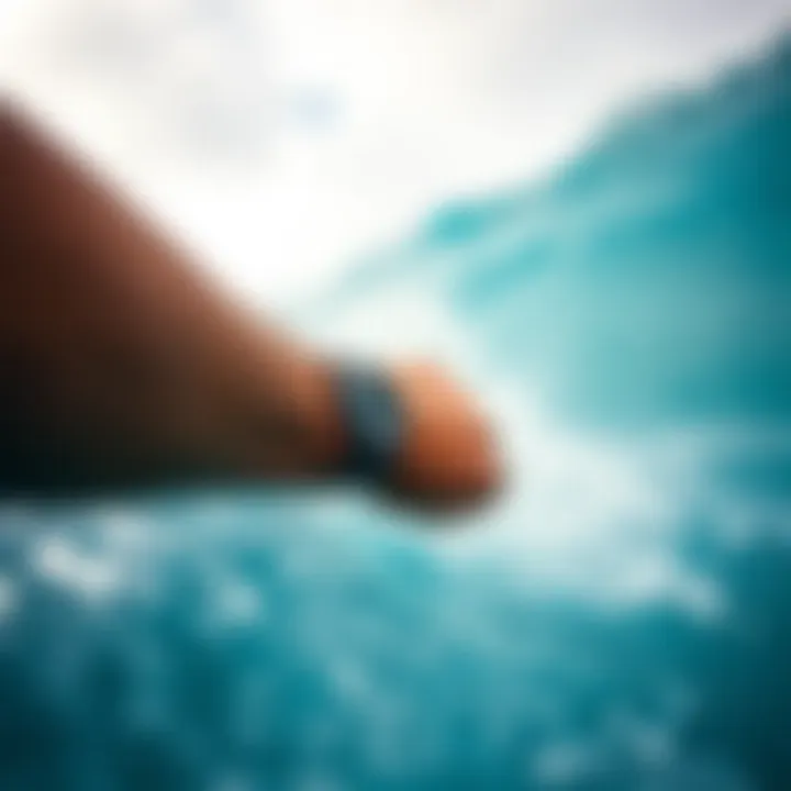 A surfer wearing a watch while catching a wave.