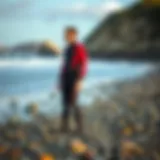 Showcasing a high-quality 2mm wetsuit on a rocky beach
