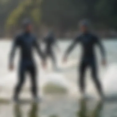 A group of watersport enthusiasts wearing front zip wetsuits during an activity.