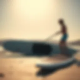 A sleek surf stand-up paddleboard on a sunny beach