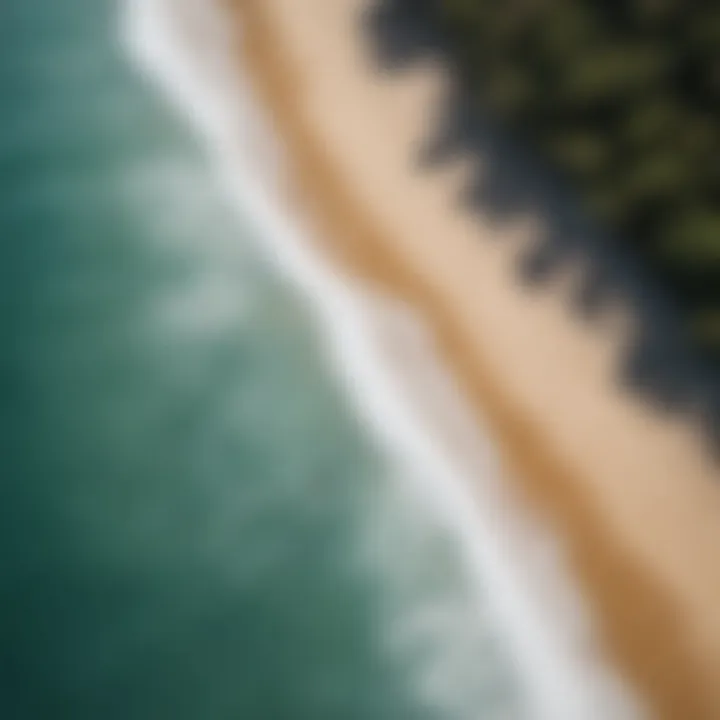 An aerial shot of a pristine beach known for its ideal surfing conditions.