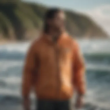 Billabong windbreaker showcased against a backdrop of waves and surfboards.