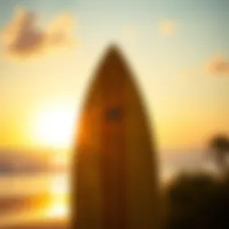 A vintage surfboard against a sunset backdrop