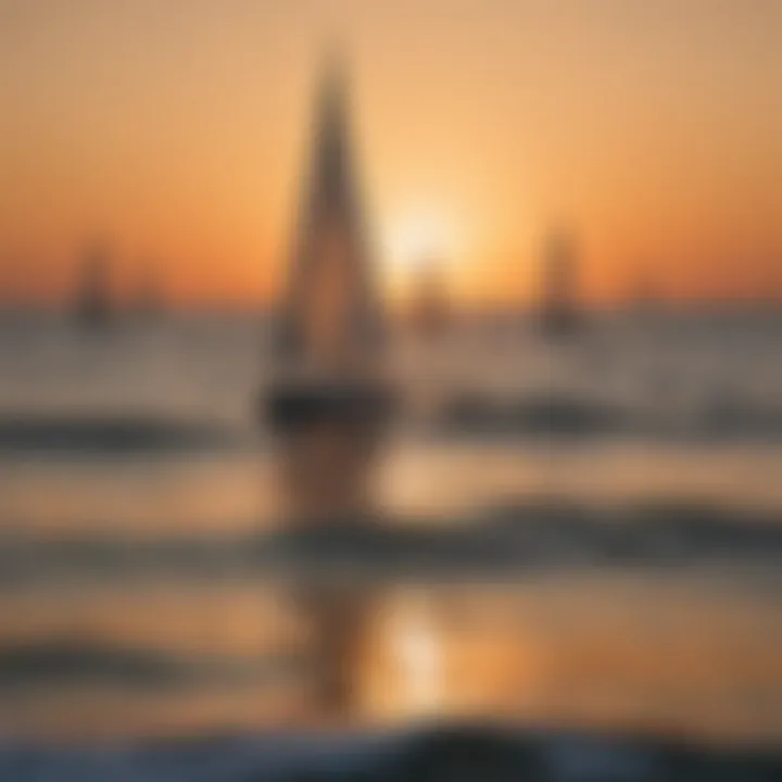 Sailboats gliding smoothly across the horizon during sunset