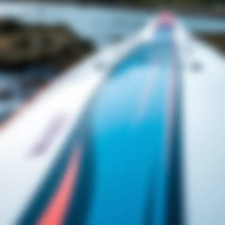 Sleek Design Features of the Wave Bandit Surfboard Close-up of Wave Bandit surfboard design showcasing its sleek lines and vibrant colors