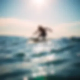 A dynamic skimboarder gliding over the water's surface