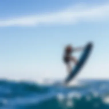 Graceful Wingfoil Surfing in Action A wingfoil surfer gracefully gliding above the water, showcasing the elegance of the sport.