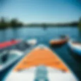 Diverse SUP Boards in a Serene Setting An overview of different SUP boards on a tranquil lake