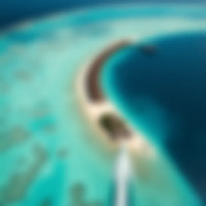 Aerial view of Vaadhoo Island showcasing its vibrant coral reefs and turquoise waters