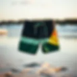 Stylish Greenlines board shorts displayed on a beach