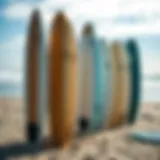 Different surfboard lengths displayed on a beach