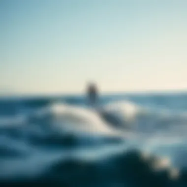 Navigating Waves on a Hydrofoil Board Scenic view of a rider navigating waves on a powered hydrofoil board under a clear sky
