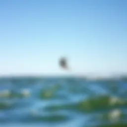 Kite surfer gliding over the water in Minnesota