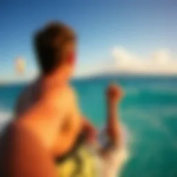 A breathtaking view of a kitesurfer riding the waves in Hawaii with a backdrop of vibrant blue skies.