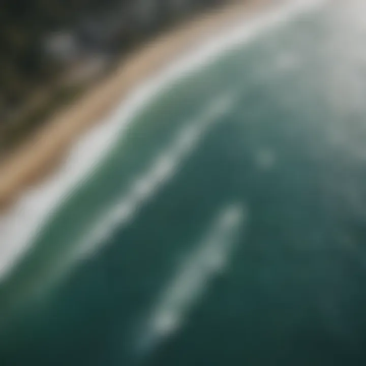 A breathtaking aerial view of a popular surf spot with surfers in the water