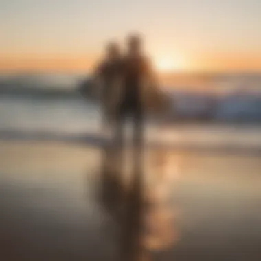 A serene beach scene showcasing surfers catching waves at sunrise